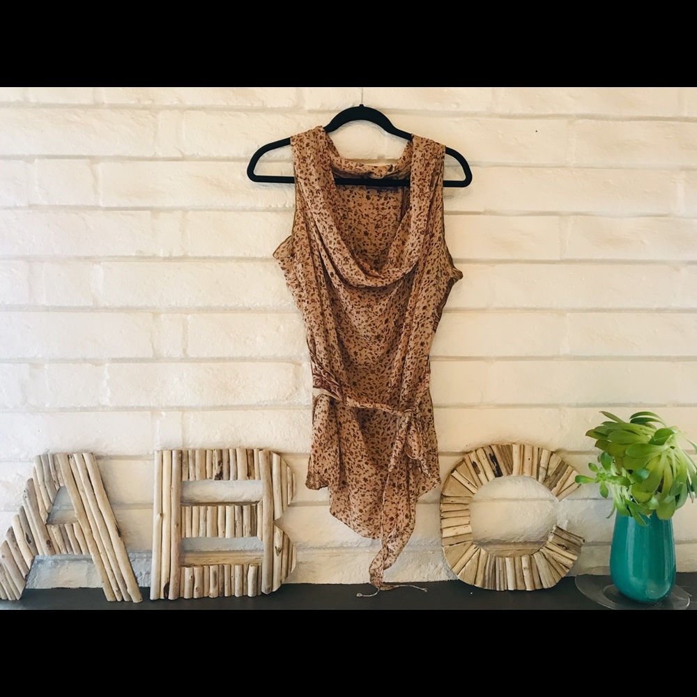Sheer sleeveless wrap top